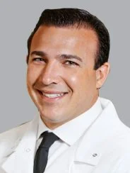 Danvers periodontist Doctor John Govostes smiling