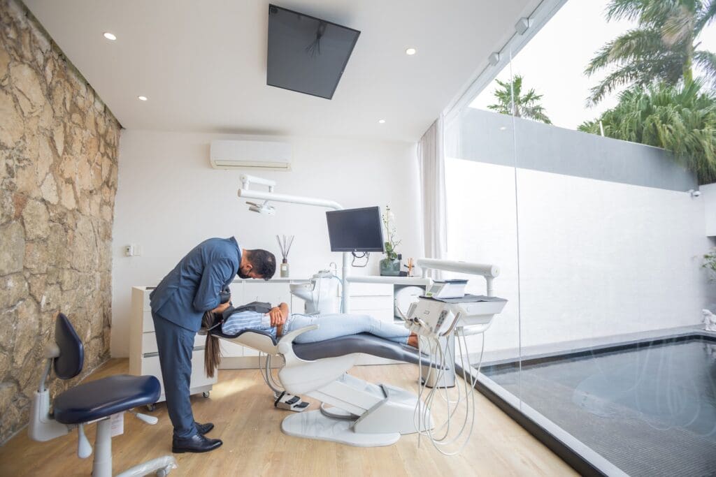 Female patient receiving dental treatment