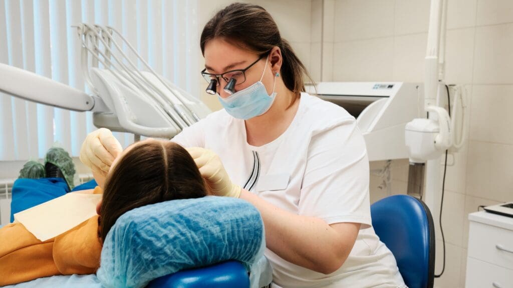 Person receiving dental emergency treatment