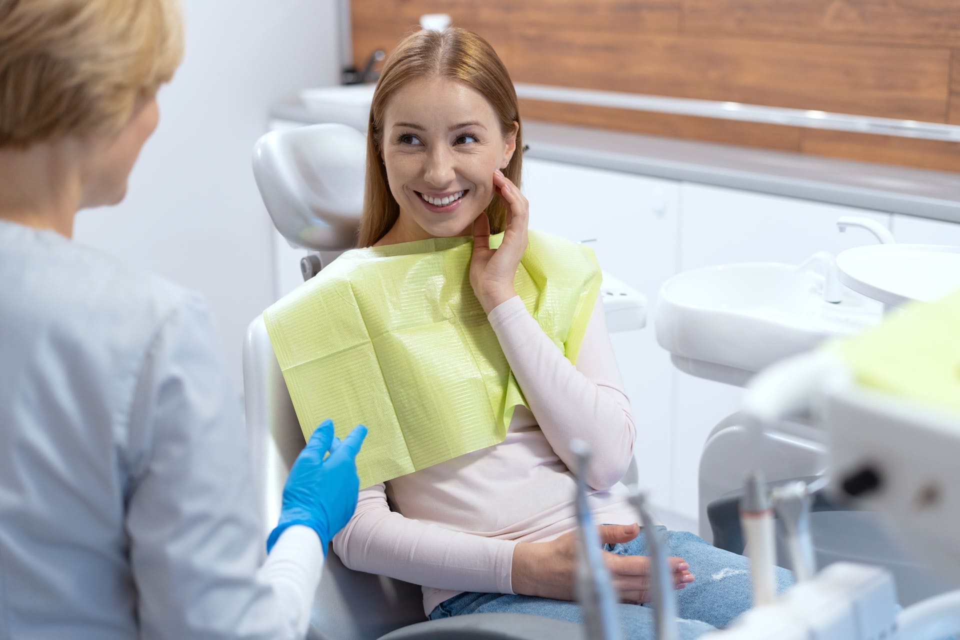 Patient visiting dentist in Denver for routine dental checkup.