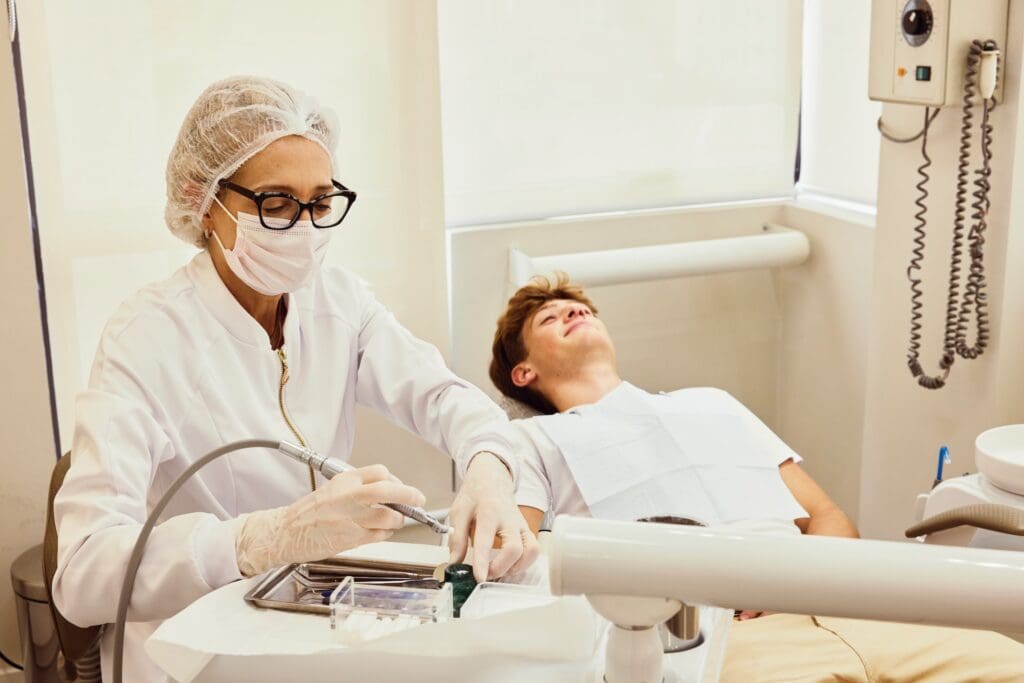 Patient visiting dentist in Denver for routine dental checkup.