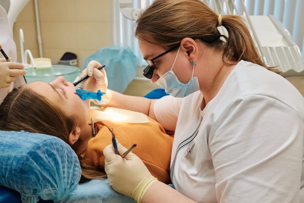 Patient undergoing Zoom teeth whitening treatment