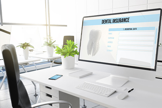 Danvers patient checking dental insurance benefits for crowns.